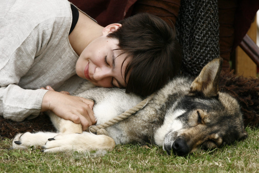 medieval girl lying with wolf lookalike dog al macphee the modest photographer